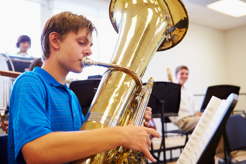 Freshman boy playing tuba 