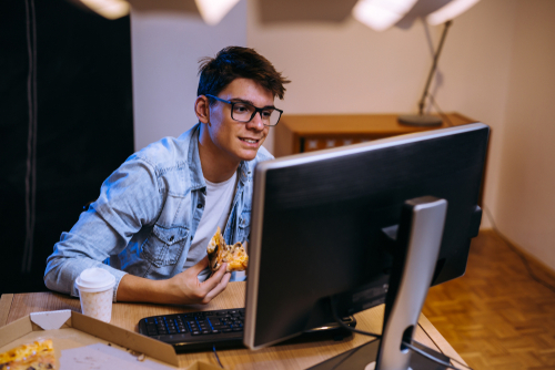 High school boy applying for college on the Common App website 