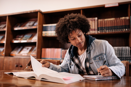 Freshman boy studying for high school