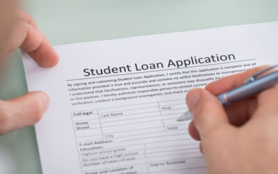 photo of someone filling out student loan application